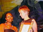Jasmin Johnson receiving Award from Noxolo Ntenetya